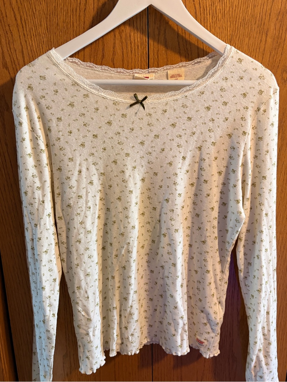 Levi’s cream floral long sleeve top